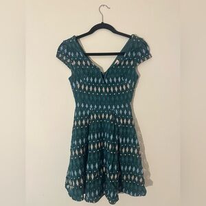 green patterned mini dress